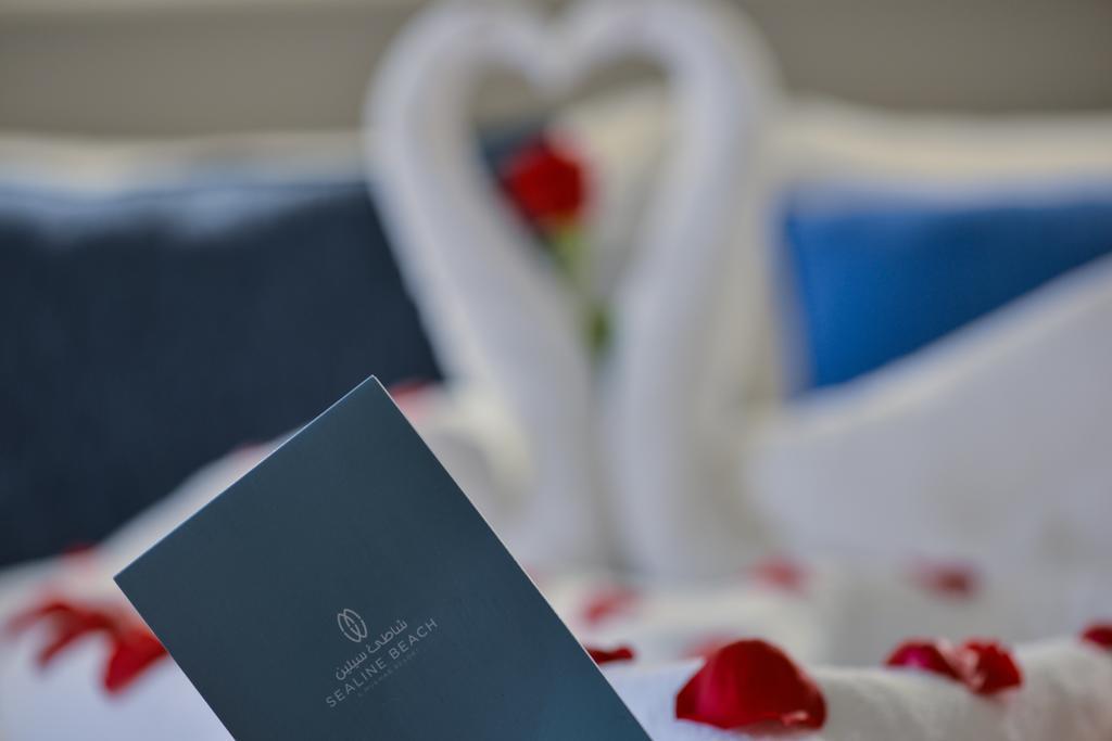 Sealine Beach, A Murwab Resort メサイード エクステリア 写真 A menu at the Waldorf Astoria Ras Al Khaimah